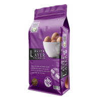 Texas Natural Feed Elite Layer Crumbles. Purple poultry feed bag.