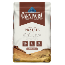 Blue Buffalo Carnivora Prairie Blend Grain-Free Adult Dry Dog Food. Tan and white feed bag.