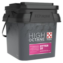 Purina High Octane Fitter 35 Topdress. Black plastic pail with pink product label.