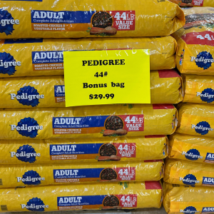 Stack of Pedigree dog food bags! Big Savings on Pedigree Dog Food at New Braunfels Feed
